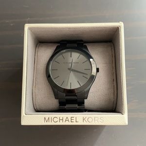Matte black Michael Kors unisex wrists watch.